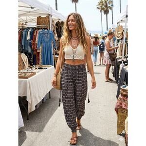 Anthropologie Chevron Print Smocked Waist Harem Jogger Pants Medium EUC Tassels